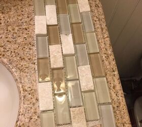 q what adhesive should i use to attach stone tile to the wall