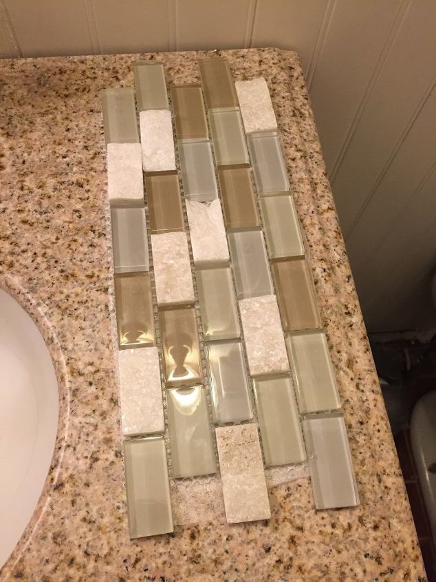 q what adhesive should i use to attach stone tile to the wall