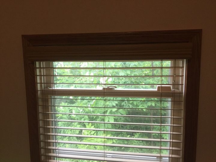 q how to hang curtains with plantation blinds without putting holes in w