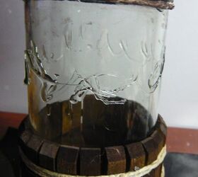 altered bottle art using twine and clothes pins
