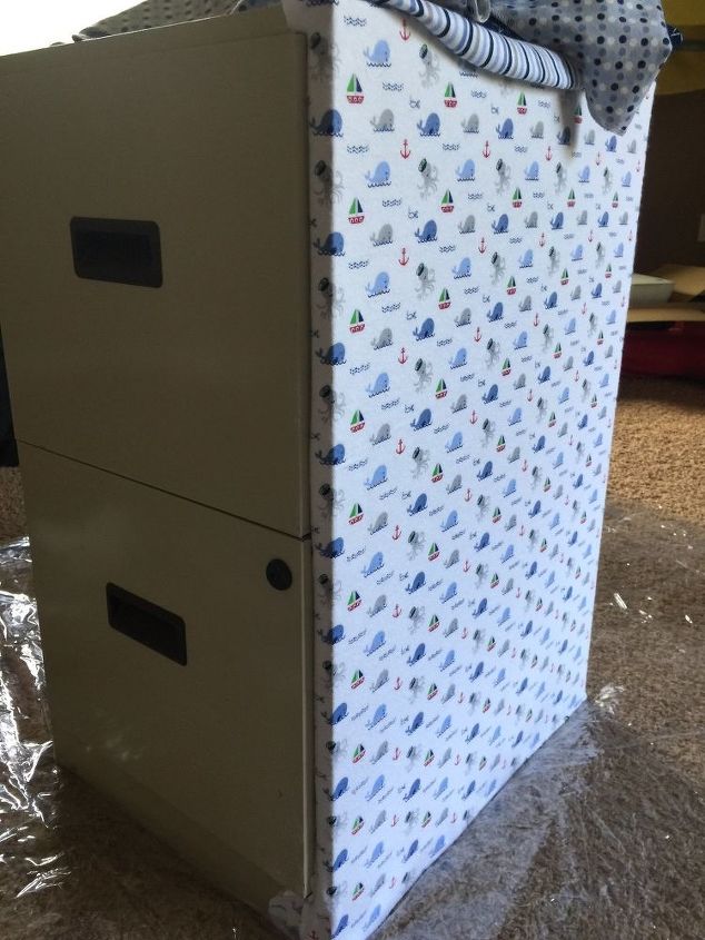 q i am working on covering a file cabinet with baby swaddling blankets