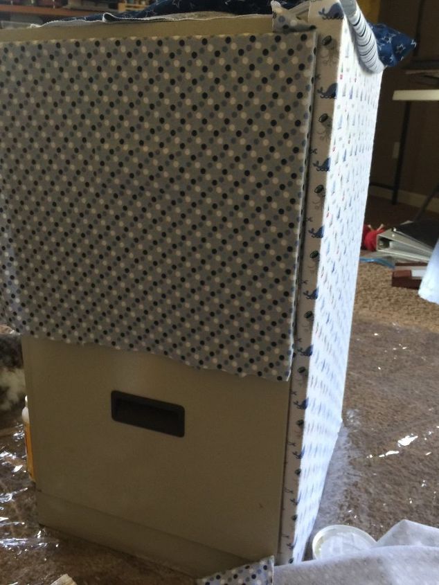 q i am working on covering a file cabinet with baby swaddling blankets