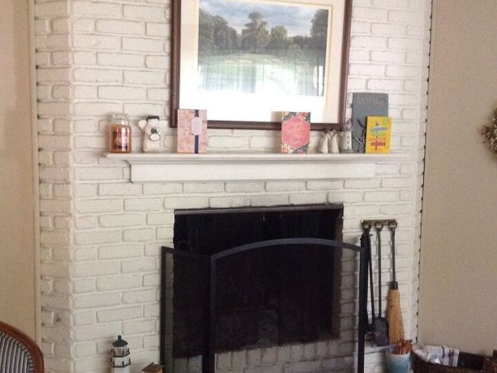 q how can i renovate my ugly painted white brick fire place surroun