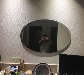 i need an idea to frame my oval shaped bathroom mirrors