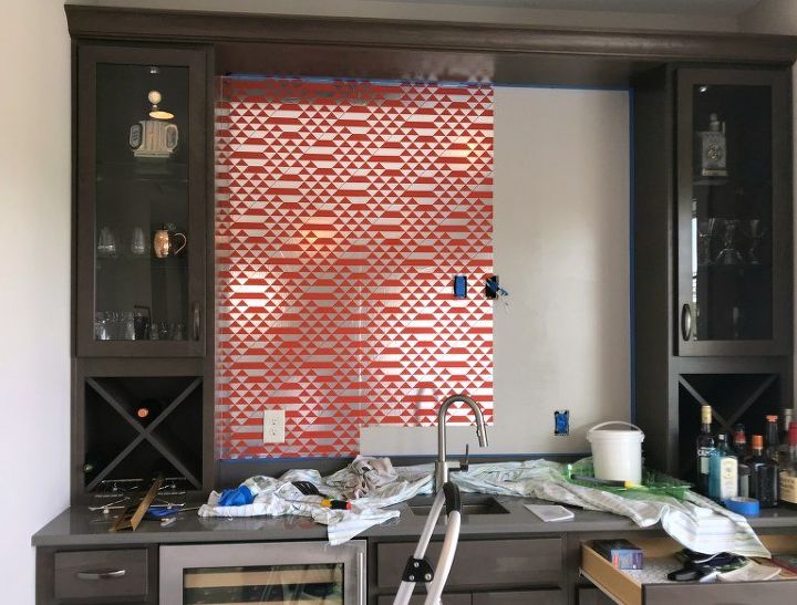 metallic wallpapered accent wall