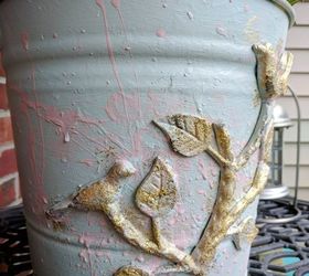 old metal bucket repurposed into charming farmhouse decor