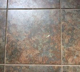 q how to repair porcelain floor tile that has a nick and a crack in it