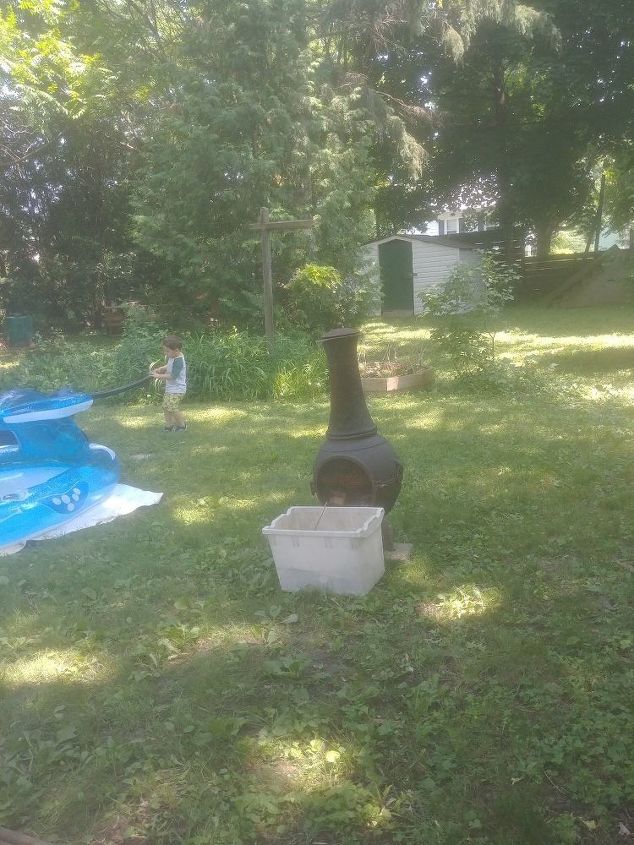 seating area around outdoor fireplace crushed gravel or pea stone