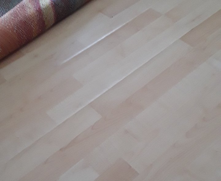 q how to repair warped flooring