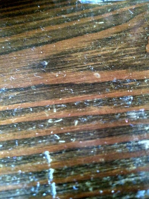 q how to remove scratch on wood