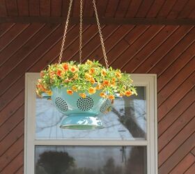 s check out these adorable container garden ideas to copy this spring, Hanging Colander Planter