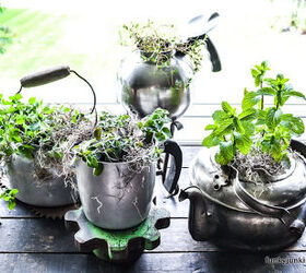 s check out these adorable container garden ideas to copy this spring, Repurposed Kettle Garden