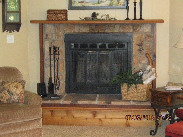 q i want to update and lighten a artificial stone fireplace