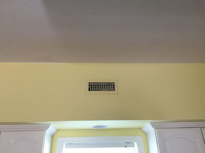 q how can i decorate around a small air vent on a soffit