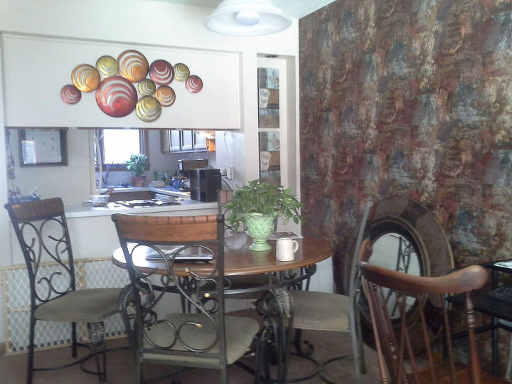 q what decorations can i put up that stand out from this wallpaper