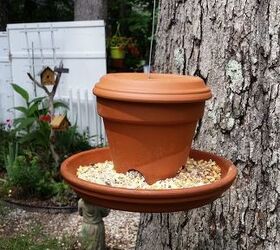 s 18 adorable bird feeders you ll want to make right now, Use a clay pot and saucer