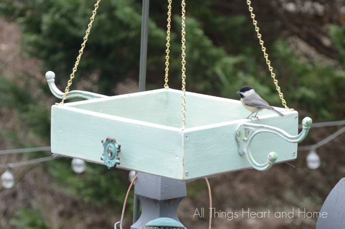 s 18 adorable bird feeders you ll want to make right now, Hang a wooden platform