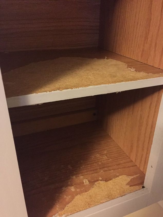 my shelves in my kitchen cabinets are peeling any ideas for repairing