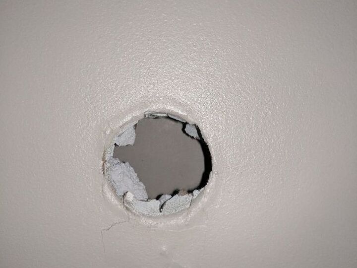 q how to fill a hole in drywall the size of a door nob