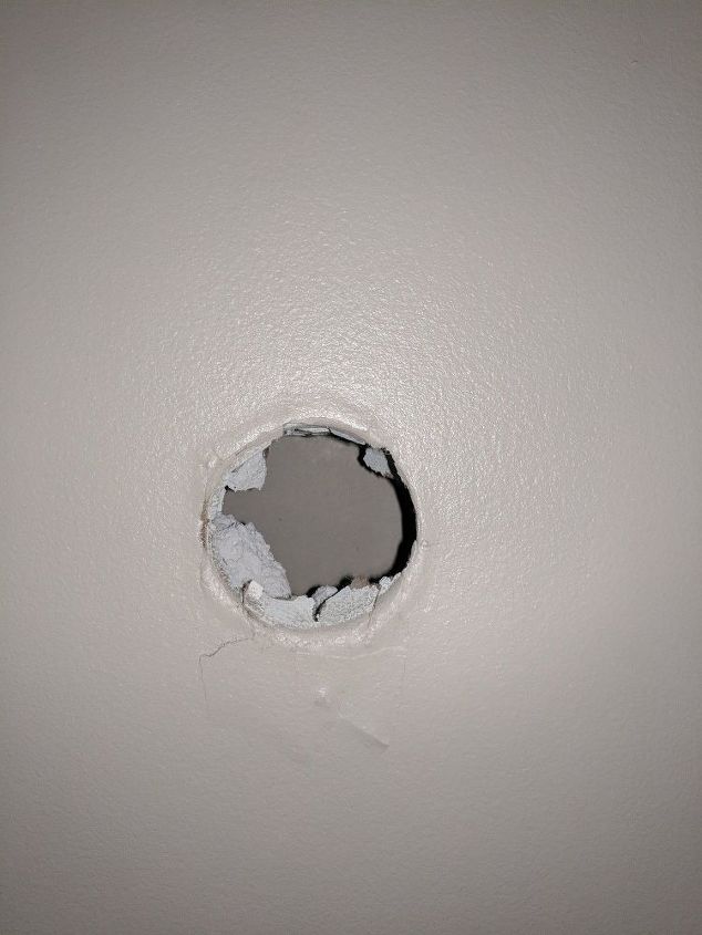 q how to fill a hole in drywall the size of a door nob