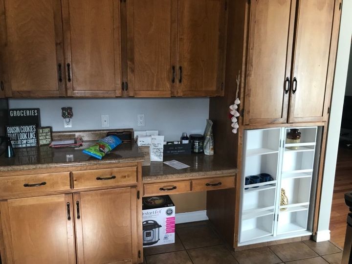 q missing cupboard door to kitcheb