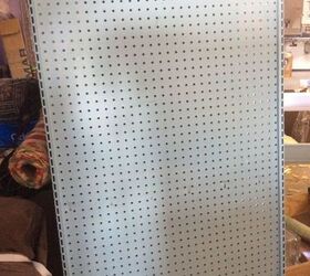 q attaching retail style pegboard shelves to the wall