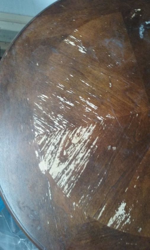 q how do i repair two table that have some kind of stain that has peeled