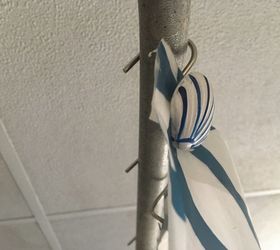 How to keep shower curtain rod from falling down?