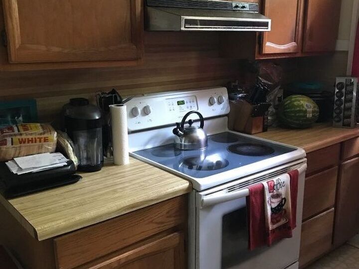 q what s a cheap way to update my kitchen counters cabinets