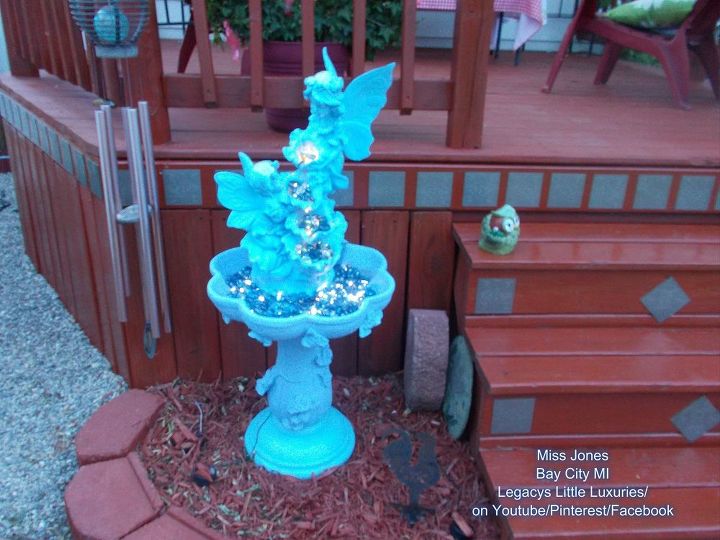 recycle water fountain into solar night time decor for garden