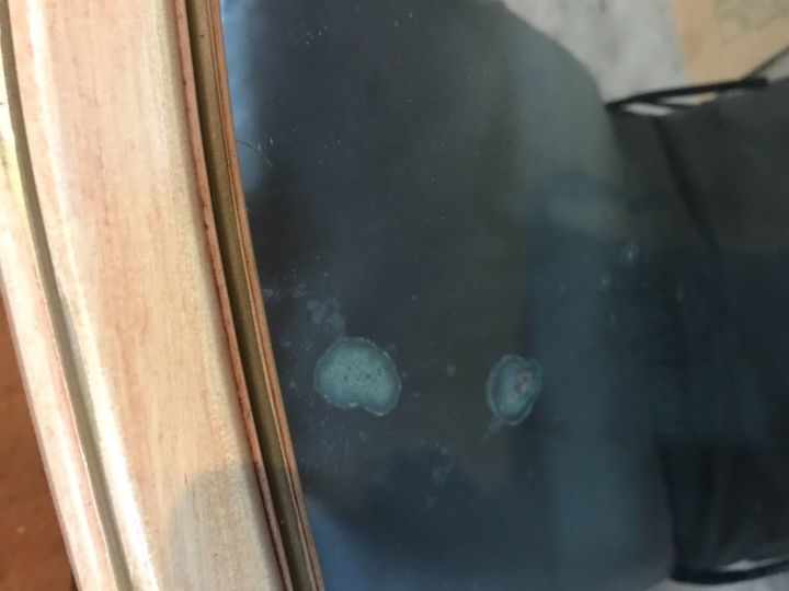 q 40 yr old mirror spots on mirror side can they be repaired