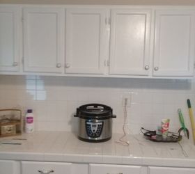 q what can i do to all white square tiles on counter tops and all backpl