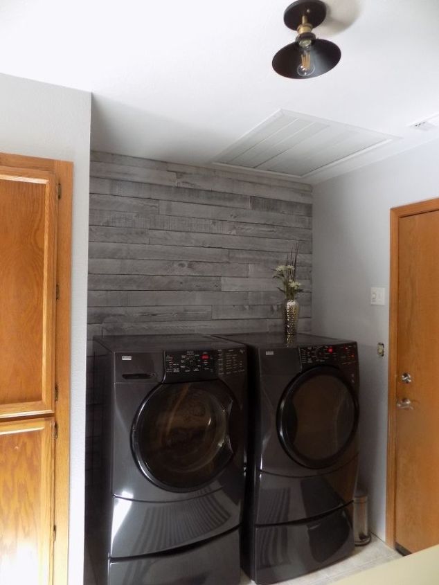 weathered wood plank wall laundry room