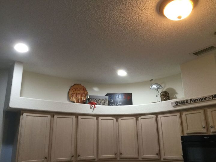q i have a 90s drop down soffits in my kitchen how do i update it