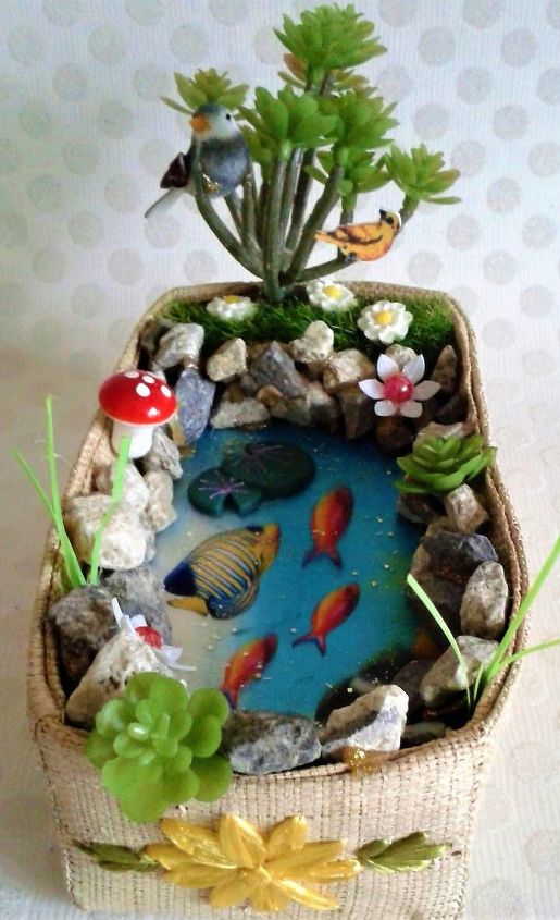 a wicker planter hosts a small garden at the fish pond