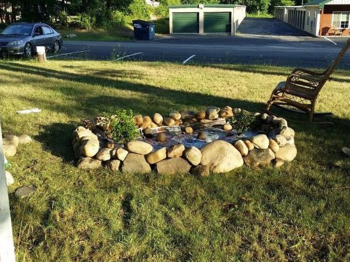 q how can i line a rock garden organically to keep soil from seeping