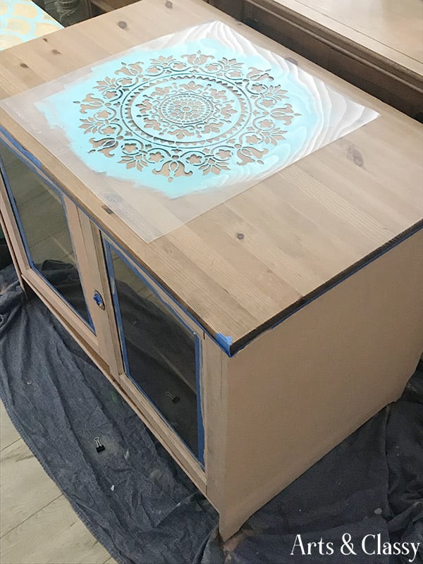 curbside find colorful stenciled cabinet makeover