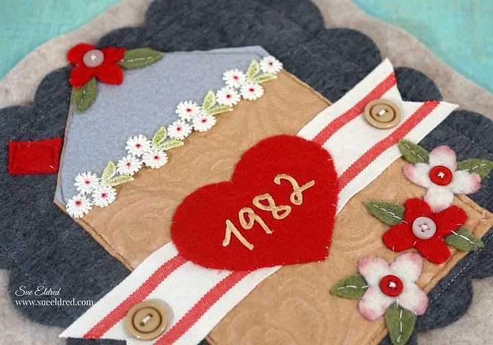 home is where the heart is stitched sampler