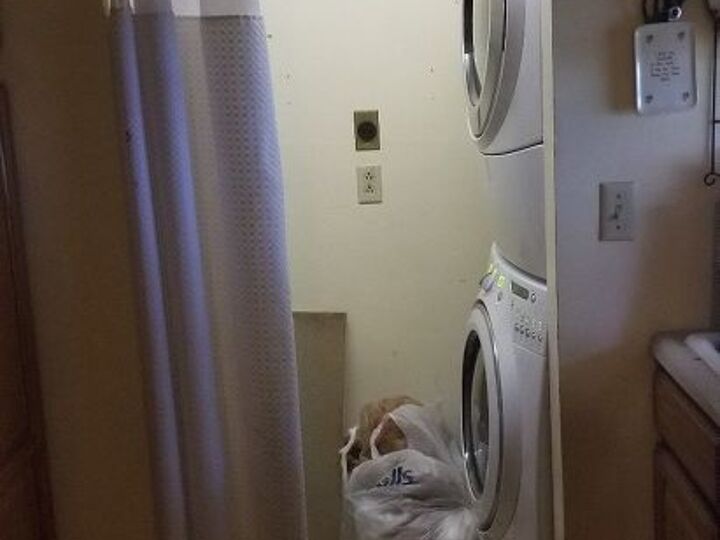 q i have a tiny laundry room hot water heater space work around