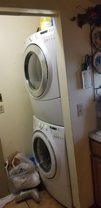 i have a tiny laundry room hot water heater space work around