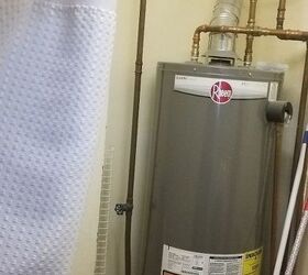 i have a tiny laundry room hot water heater space work around