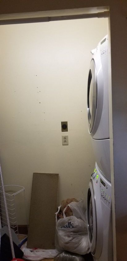 q i have a tiny laundry room hot water heater space work around