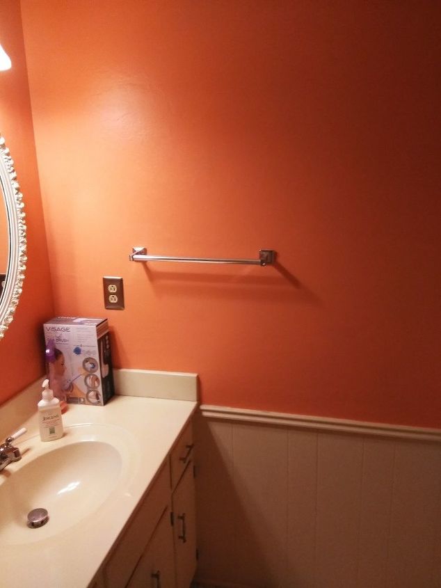 q how do i decorate my freshly painted guest bathroom