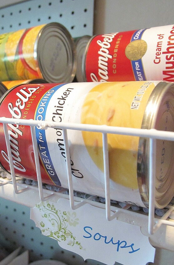 16 brilliant wire basket hacks everyone s doing right now, Line Up Canned Food In A Dollar Store Basket