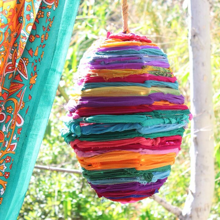 16 brilliant wire basket hacks everyone s doing right now, Weave In Colorful Fabric For A Boho Lamp