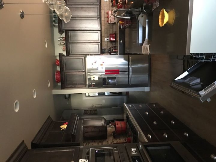 q we have a new home with dark cupboards which makes my kitchen is k