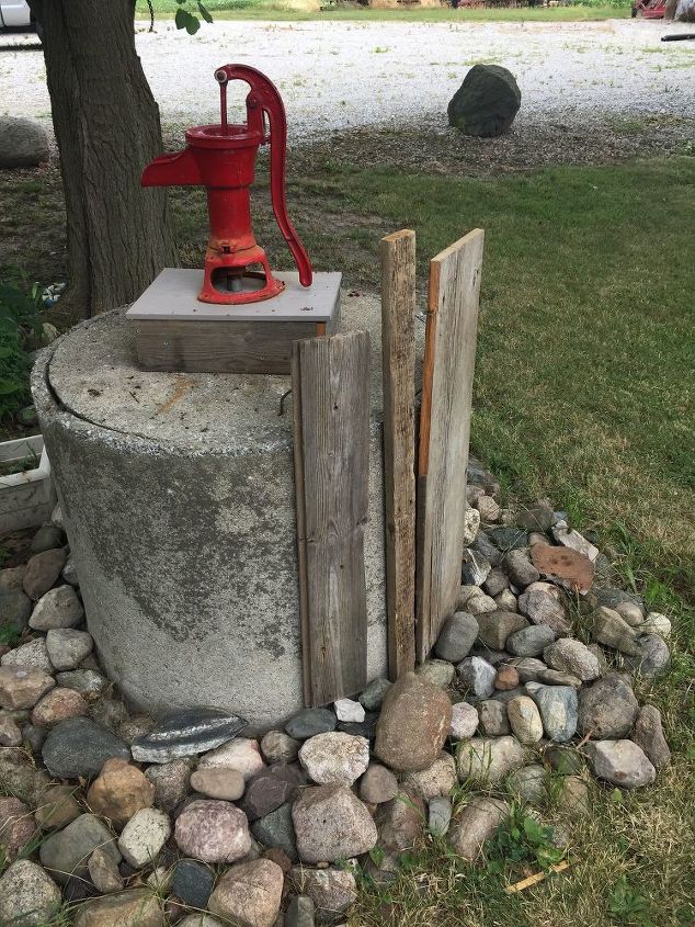 q adding barn wood to cement well culvert