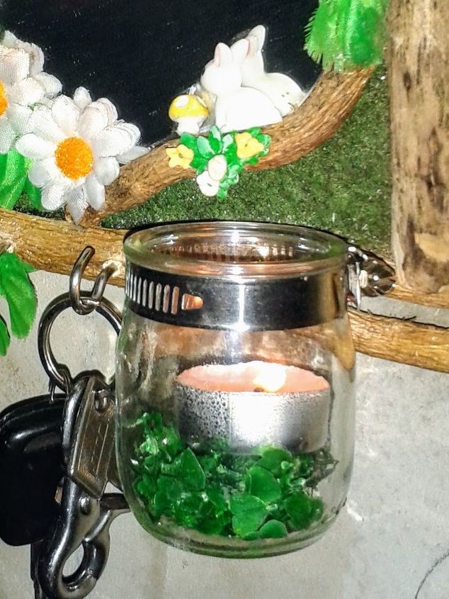 light flat candle or led wall sconce in a jar integrated into a float