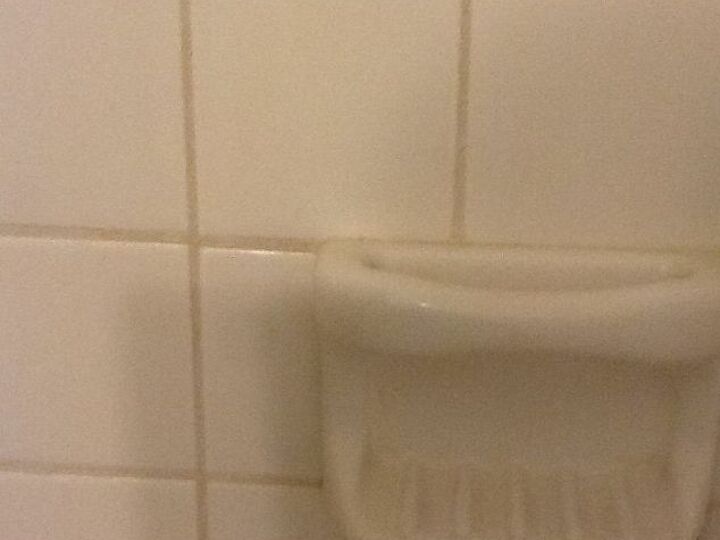 q how do i clean the grout in my shower