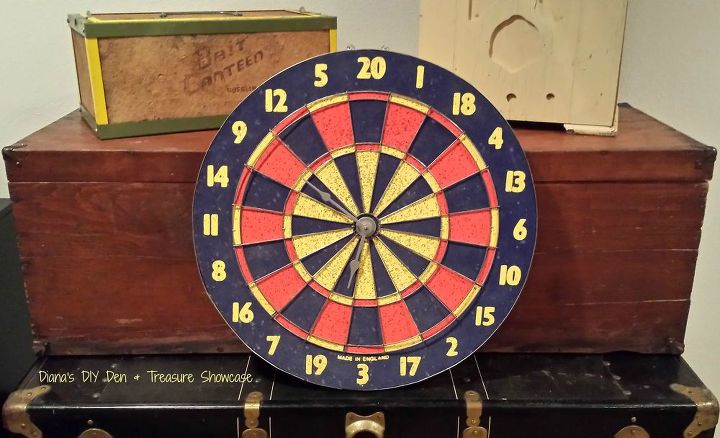 22 diy wall clocks you ll love, Repurposed Dart Board Clock